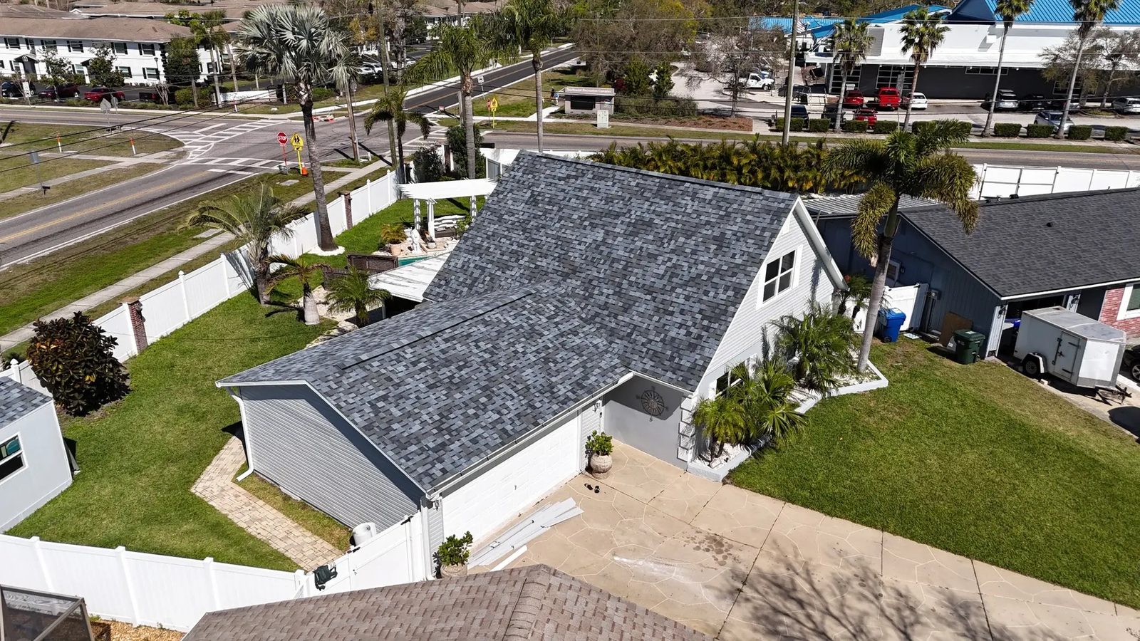 Home exterior with new roof, gutters, and soffit