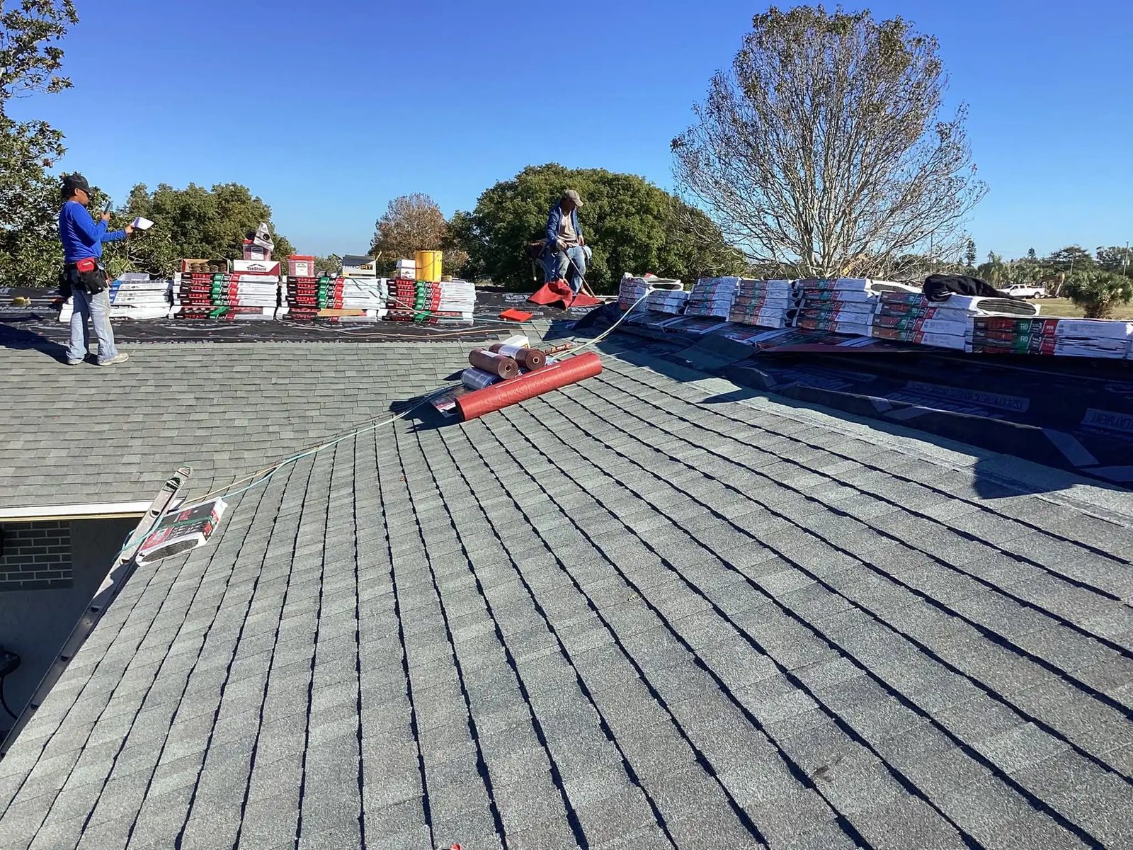 RoofSource crew installing shingles, video thumbnail