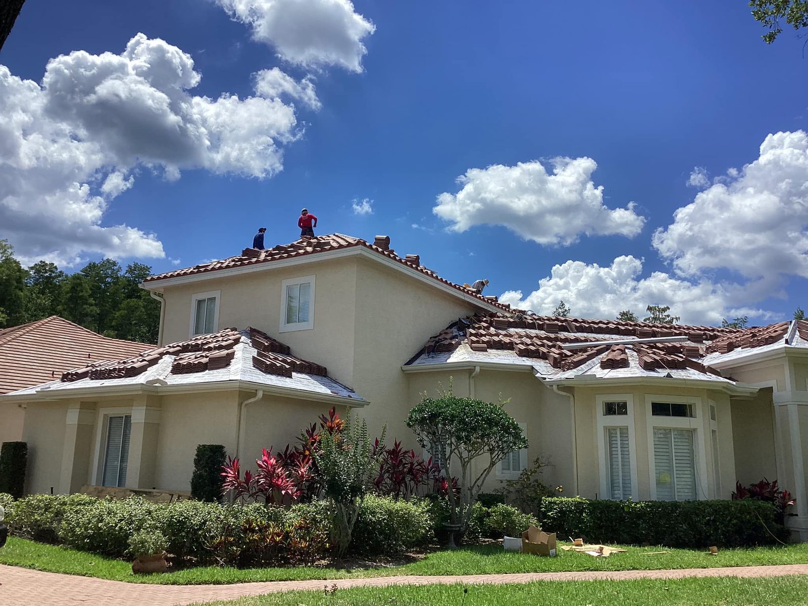Tile roof installation crew on a Central Florida home